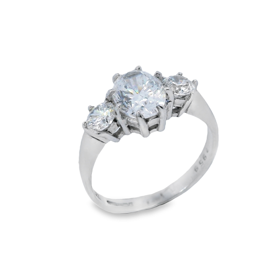 Oval Centre Three Stone Claw Set Ring
